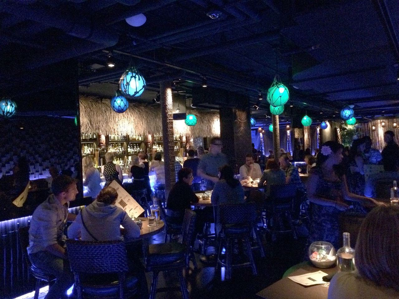 The bar room at Three Dots and a Dash.
